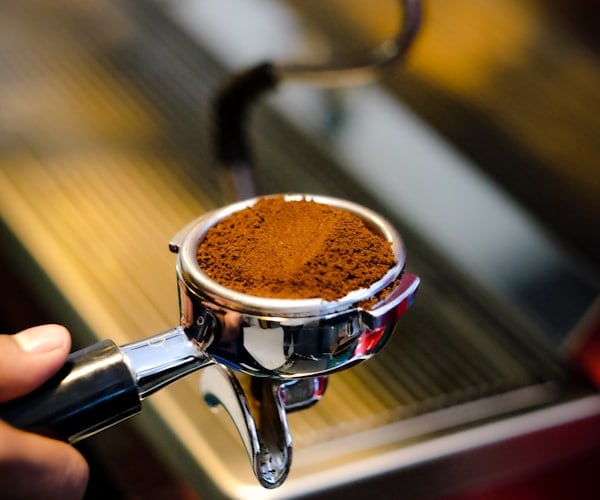 On-demand espresso grinder with portafilter