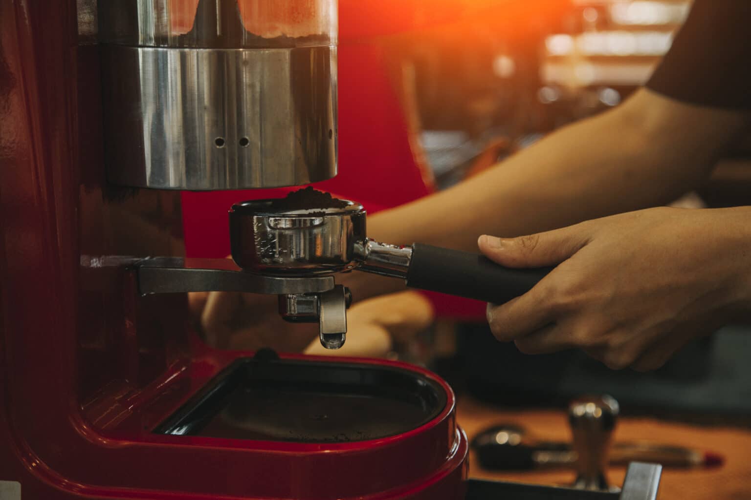 Engineer servicing a commercial coffee machine